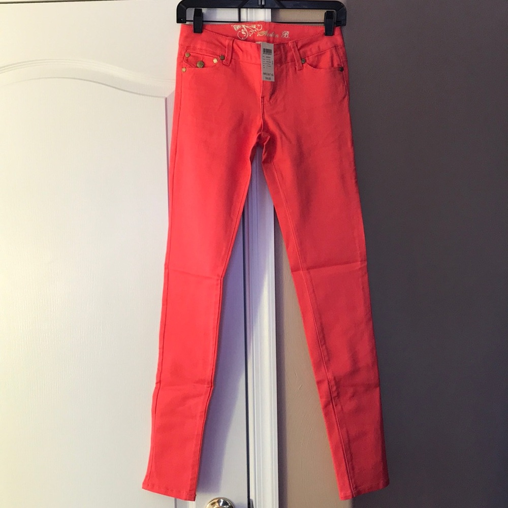 NEW ARDEN B HOT CORAL SKINNY JEANS.